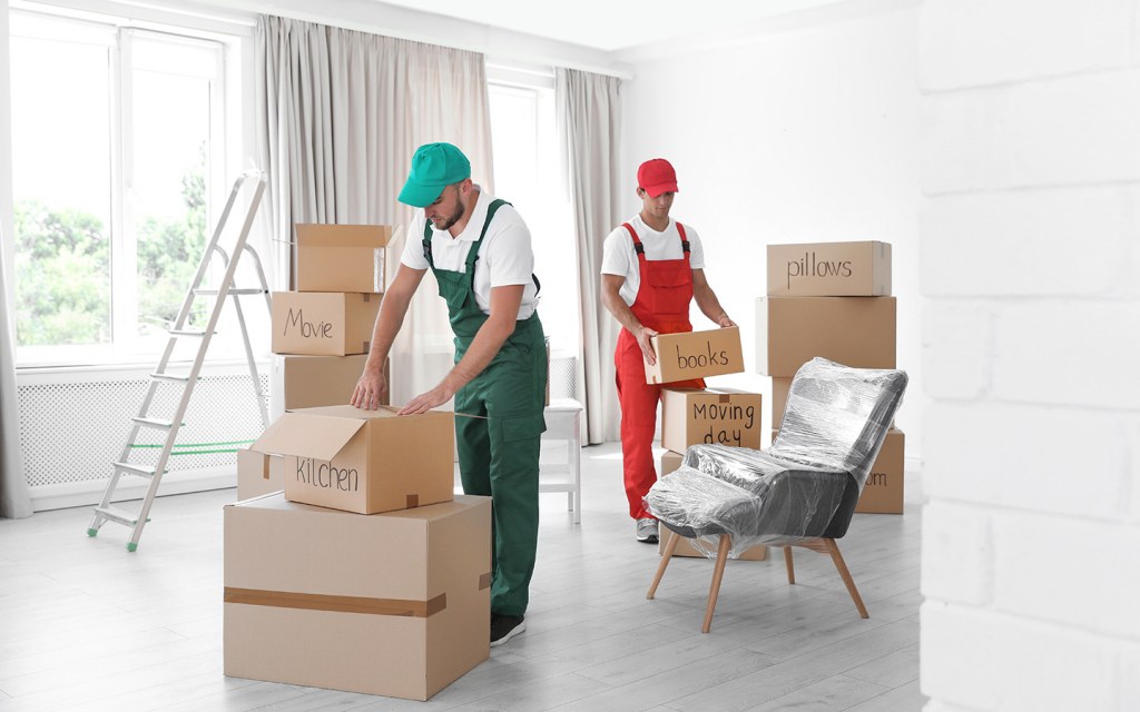 Professional villa movers in Dubai safely packing and transporting household furniture and items.