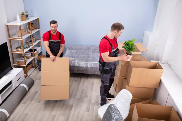Professional villa movers in Dubai safely packing and transporting household furniture and items.