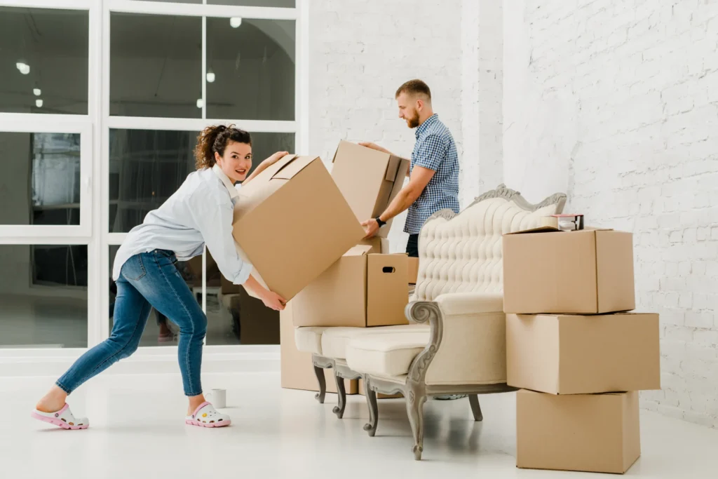Professional villa movers in Dubai safely packing and transporting household furniture and items.