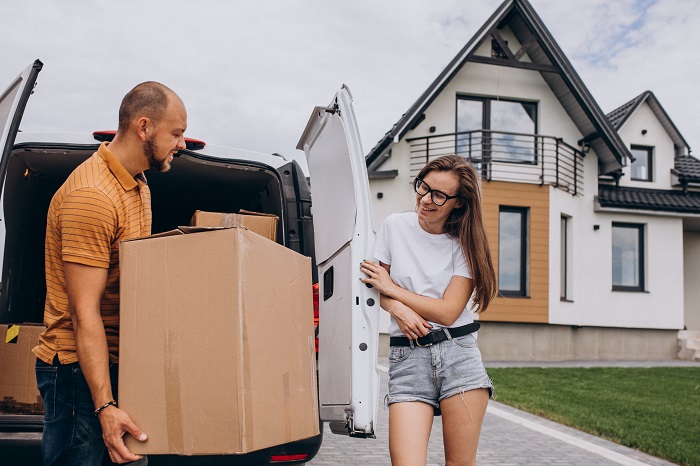 Professional villa movers in Dubai safely packing and transporting household furniture and items.